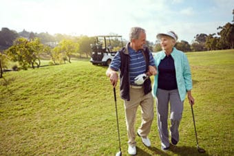 Alden Estates of Jefferson, Nursing Home in Jefferson, WI — Senior couple walking on a golf course