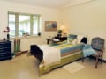 Alden Estates of Jefferson, Nursing Home in Jefferson, WI — Cozy bedroom with a bed and natural light
