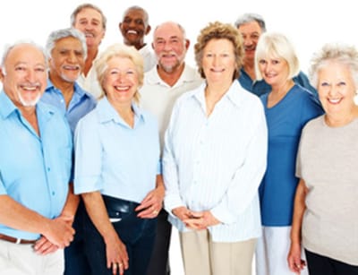 Group of seniors posing together with smiles