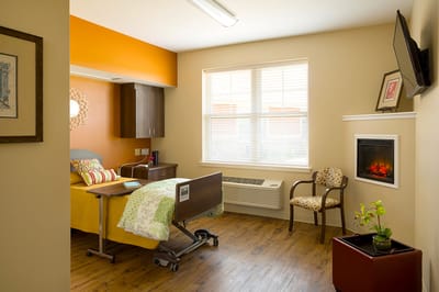 Bright, cozy private resident room with furnishings