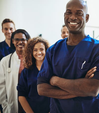 Healthcare staff smiling in a bright interior