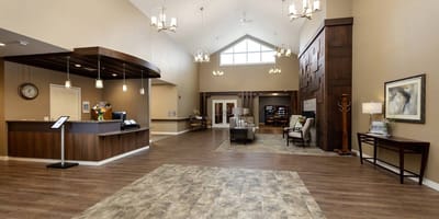 Bright and spacious lobby area of a senior living facility