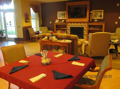 Common area with seating and a dining table
