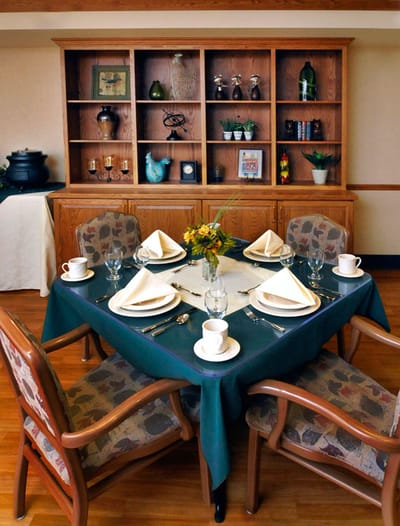 Dining table set for a meal in a cozy dining room