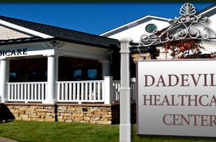 Dadeville Healthcare Center, Nursing Home in Dadeville, AL — Dadeville Healthcare Center entrance with stone and white accents