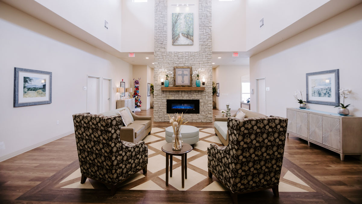 Bright interior lounge area with seating and decor