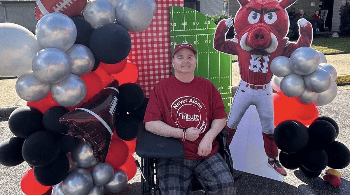 Resident enjoying a festive outdoor event with decorations