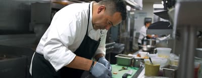 Chef preparing food in a facility kitchen