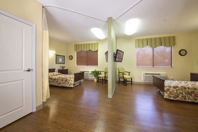 Interior view of a shared resident room with two beds