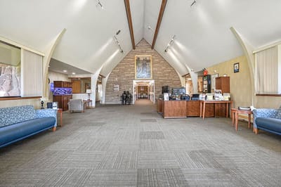 Bright common area with seating and decorative features