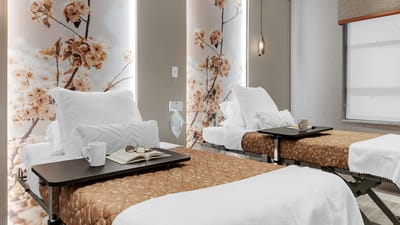 Cozy resident room with floral decor and amenities