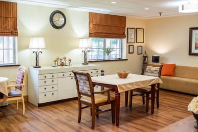 Cozy lounge area with seating and decorative elements