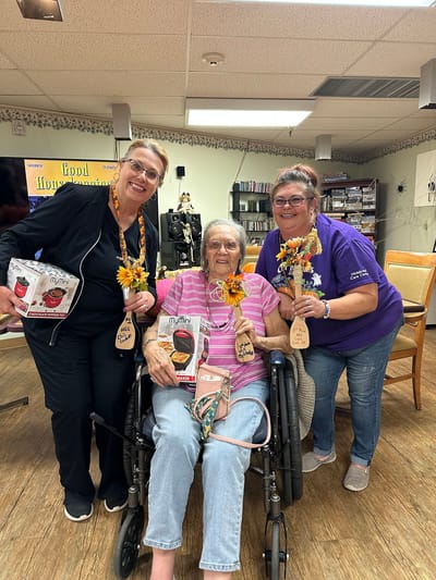 Residents and staff celebrating with crafts and decorations