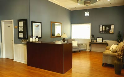 Bright reception area with seating and decor