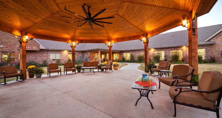Covered outdoor seating area with comfortable chairs