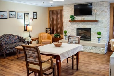 Cozy common area with seating and fireplace
