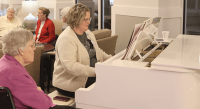 Residents enjoying music in a common area