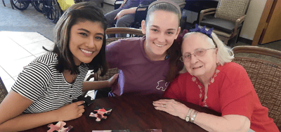 Residents and staff engaged in a fun activity