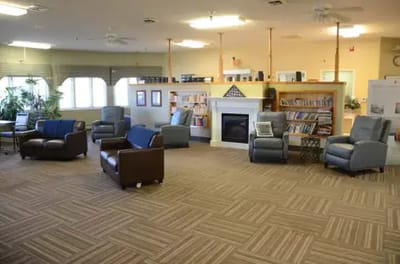 Interior view of a cozy common area with seating