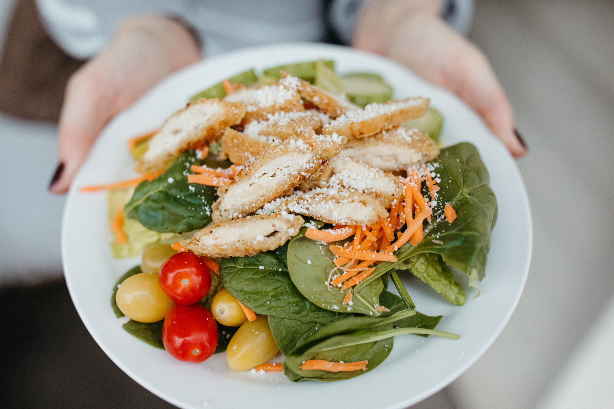 A delicious salad with grilled chicken and vegetables