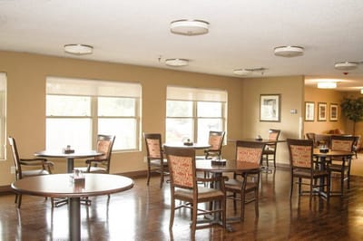 Bright dining area with tables and chairs