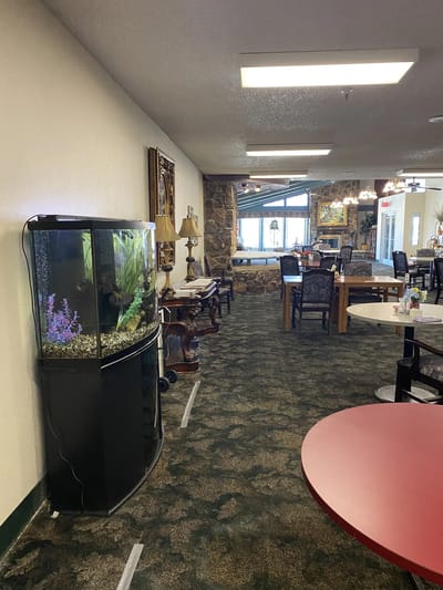Interior hall with an aquarium and dining area