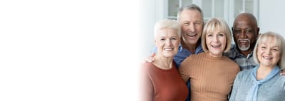 Group of smiling seniors posing together