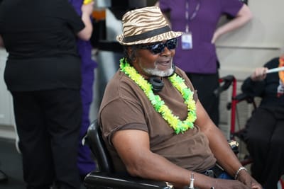 Resident enjoying a festive celebration in a common area