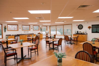 Interior dining area with tables and chairs
