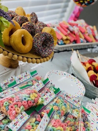 Food display of colorful snacks and donuts