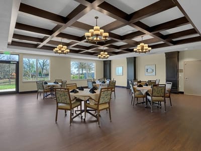 Bright dining room with tables and chairs