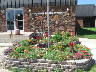 Flower garden at the entrance of Truman Lake Manor