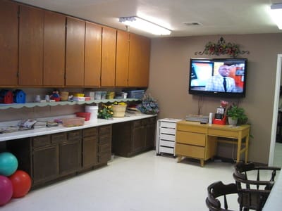 Bright interior room with cabinets and television