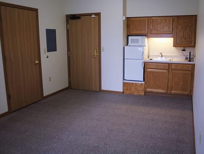 A small kitchen area in a resident room