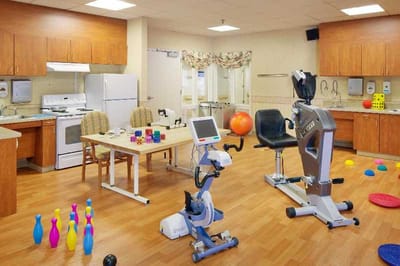 Activity room with fitness equipment and games