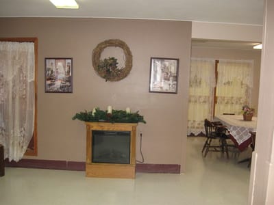 Interior view of a common area with a fireplace