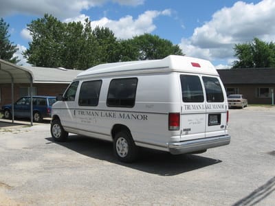 Facility transport van parked outside
