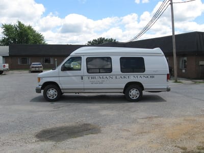 Facility transport van parked outside