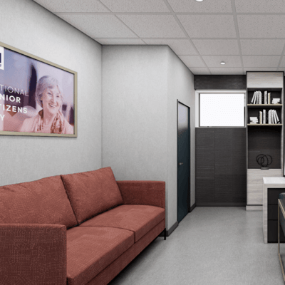 Interior lounge area with a couch and wall art