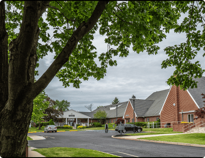 Exterior view of the facility amidst greenery