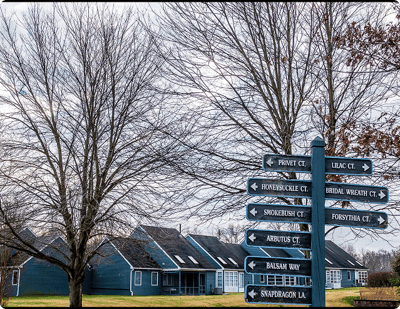 Signpost in front of a senior living facility