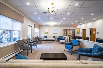 Bright communal lounge area with comfortable seating