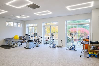 Interior view of a fitness area with exercise equipment