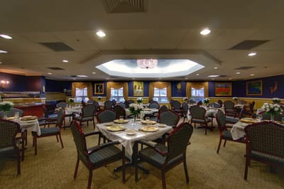 Elegant dining room setup with tables and decor