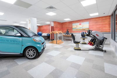 Rehabilitation room with exercise equipment and facility transport