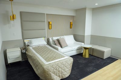 Comfortable resident room with seating and decor