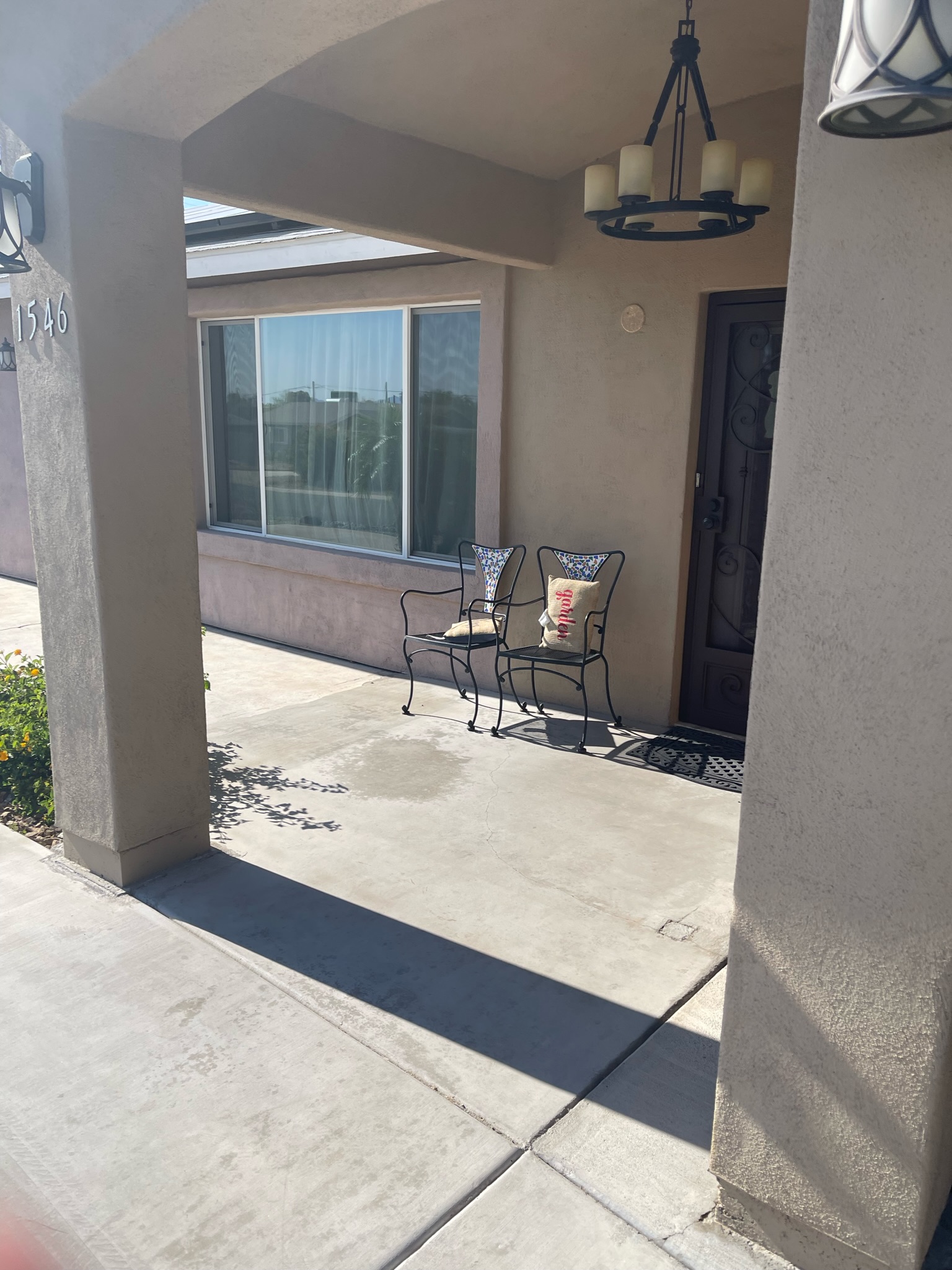Seating area outside a residential doorway