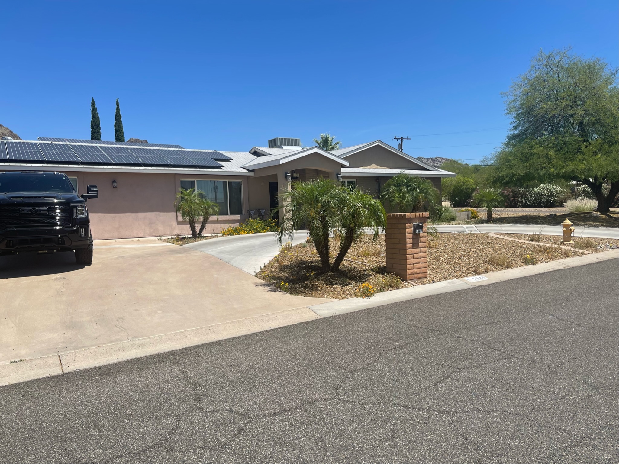 Exterior view of a senior living facility with landscaping