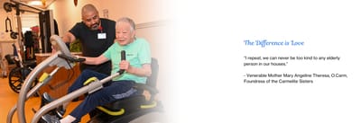 A resident using a therapy bike with staff assistance