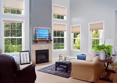 Bright common area with large windows and comfortable seating